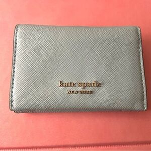 Lightly used Kate spade card wallet, light blue.